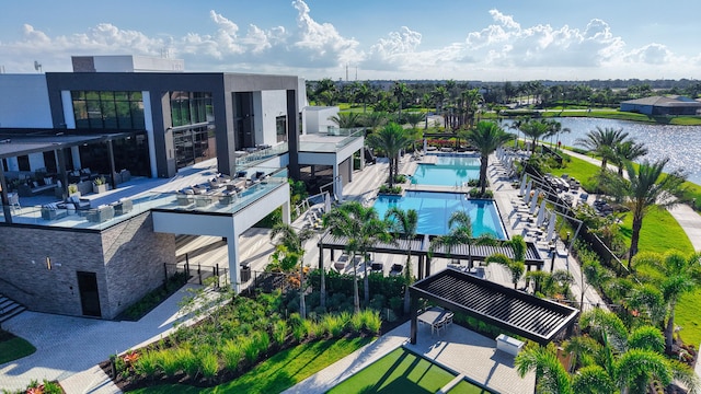 11687 SW Viridian Blvd, Port Saint Lucie, FL 34987 - drone / aerial view of a pool area and a nearby body of water