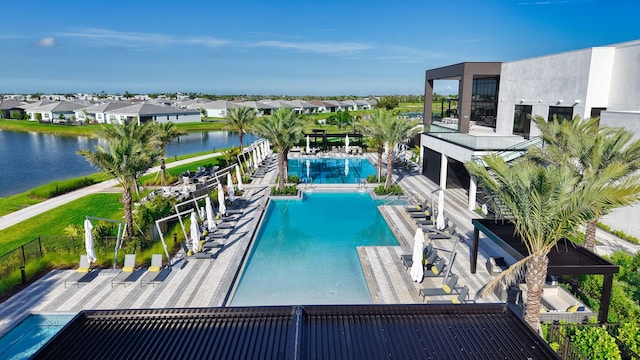 11687 SW Viridian Blvd, Port Saint Lucie, FL 34987 - community pool with a residential view and a water view