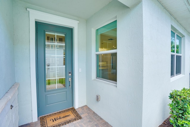 11687 SW Viridian Blvd, Port Saint Lucie, FL 34987 - entrance to property with stucco siding