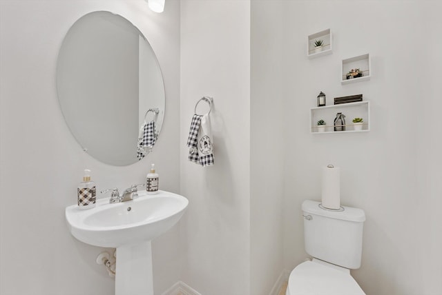 6161 Rancho Ln, West Palm Beach, FL 33415 - bathroom with toilet and a sink