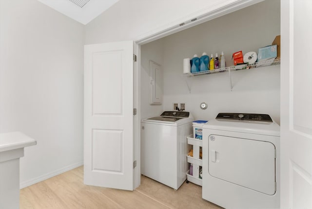 6161 Rancho Ln, West Palm Beach, FL 33415 - laundry room with independent washer and dryer, electric panel, and light wood finished floors