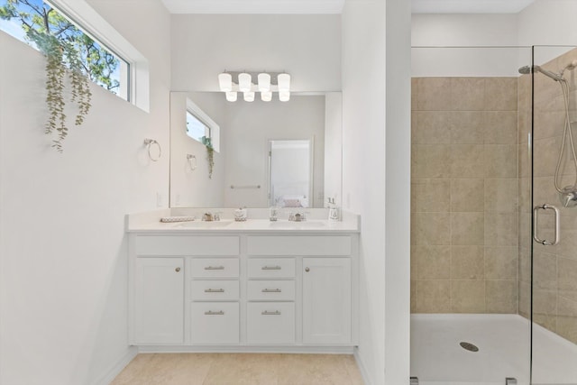 6161 Rancho Ln, West Palm Beach, FL 33415 - full bath featuring tiled shower, double vanity, and tile patterned floors