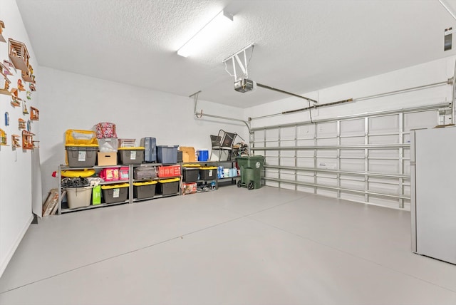 6161 Rancho Ln, West Palm Beach, FL 33415 - garage with freestanding refrigerator and a garage door opener