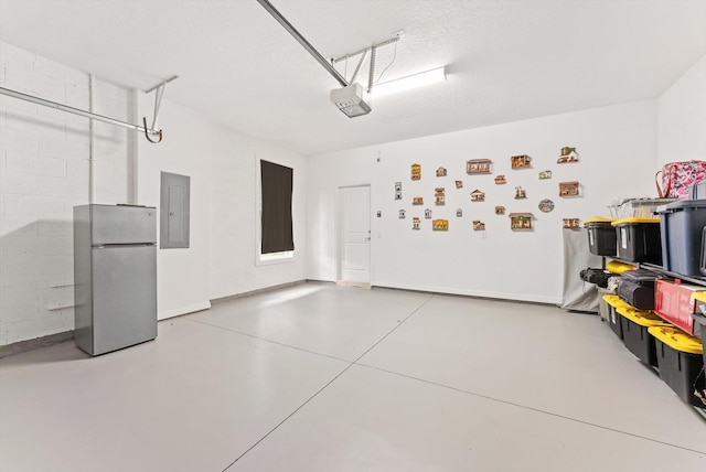 6161 Rancho Ln, West Palm Beach, FL 33415 - garage featuring freestanding refrigerator, electric panel, and a garage door opener