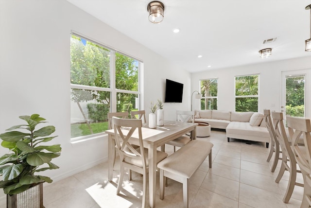 6161 Rancho Ln, West Palm Beach, FL 33415 - dining space with healthy amount of natural light, light tile patterned flooring, and recessed lighting