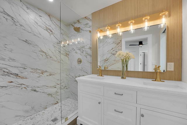 950 York St, West Palm Beach, FL 33401 - bathroom featuring a marble finish shower, double vanity, and ceiling fan