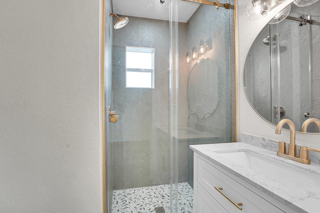 950 York St, West Palm Beach, FL 33401 - bathroom with a stall shower, a textured wall, and vanity