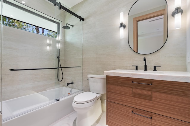 2265 NE 30th Ct, Lighthouse Point, FL 33064 - full bathroom with tile walls, shower / bath combination with glass door, and vanity
