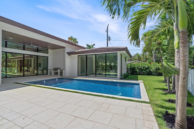 2265 NE 30th Ct, Lighthouse Point, FL 33064 - swimming pool featuring a patio, a yard, and grilling area