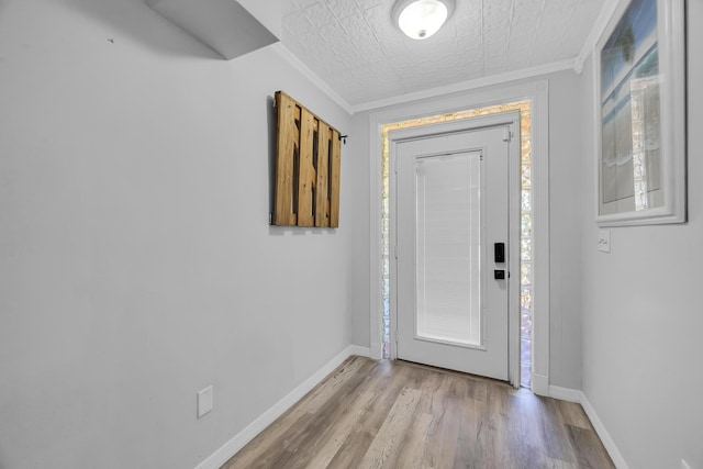 356 SW Grimaldo Ter, Port Saint Lucie, FL 34984 - entrance foyer with ornamental molding and wood finished floors