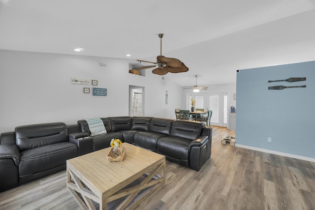 356 SW Grimaldo Ter, Port Saint Lucie, FL 34984 - living area with wood finished floors, ceiling fan, vaulted ceiling, and recessed lighting