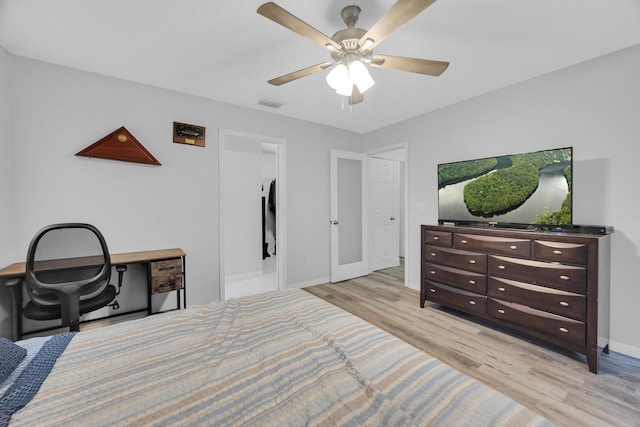 356 SW Grimaldo Ter, Port Saint Lucie, FL 34984 - bedroom featuring light wood-type flooring and a ceiling fan