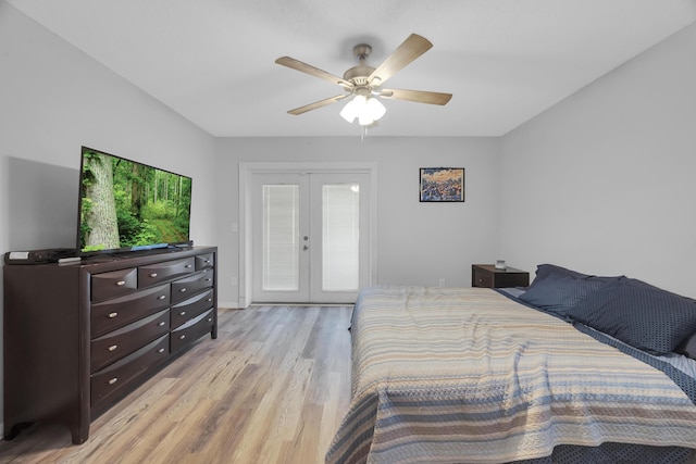 356 SW Grimaldo Ter, Port Saint Lucie, FL 34984 - bedroom featuring french doors, light wood-style floors, access to outside, and ceiling fan
