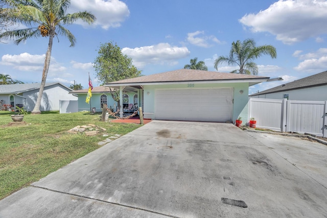 356 SW Grimaldo Ter, Port Saint Lucie, FL 34984 - single story home with stucco siding, concrete driveway, and an attached garage
