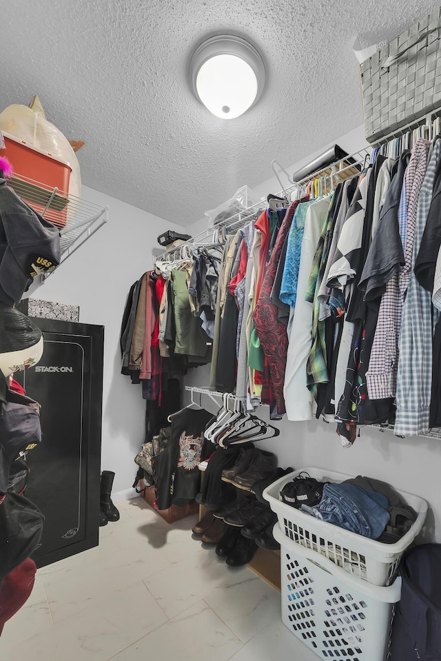 356 SW Grimaldo Ter, Port Saint Lucie, FL 34984 - walk in closet featuring marble finish flooring