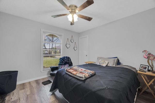 356 SW Grimaldo Ter, Port Saint Lucie, FL 34984 - bedroom with wood finished floors and a ceiling fan