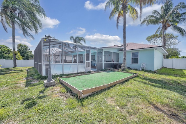 356 SW Grimaldo Ter, Port Saint Lucie, FL 34984 - rear view of house featuring a fenced backyard, stucco siding, and a lanai