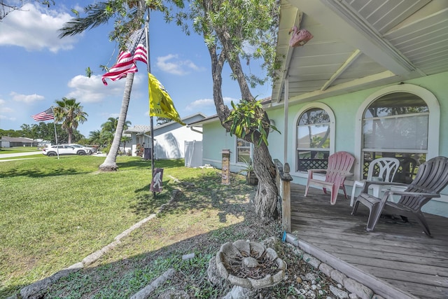 356 SW Grimaldo Ter, Port Saint Lucie, FL 34984 - deck featuring a yard