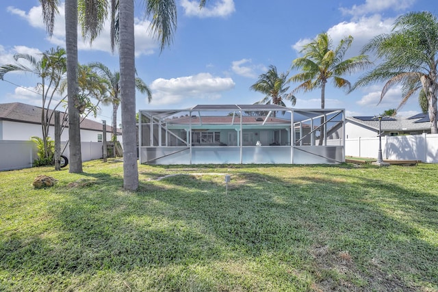 356 SW Grimaldo Ter, Port Saint Lucie, FL 34984 - rear view of house with a fenced backyard and a lanai