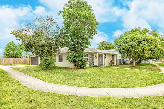 1518 Lee Ct, Lake Worth, FL 33461 - view of front of house featuring driveway and stucco siding