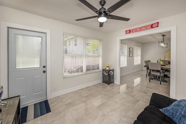 1518 Lee Ct, Lake Worth, FL 33461 - entryway featuring light marble finish flooring and ceiling fan