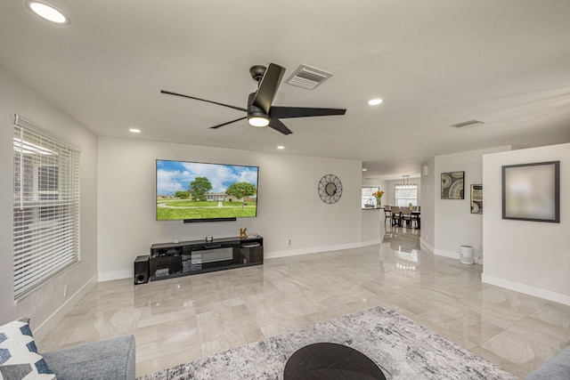 1518 Lee Ct, Lake Worth, FL 33461 - living room featuring marble tiled floors, recessed lighting, and ceiling fan