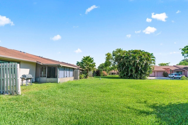 18 Winchmore Ln, Boynton Beach, FL 33426 - view of green lawn featuring a sunroom