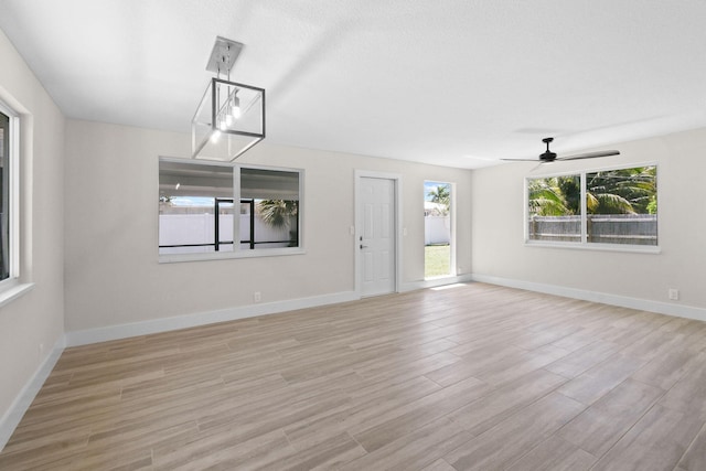 1522 Lance Rd, Jupiter, FL 33469 - unfurnished room featuring light wood-type flooring and ceiling fan