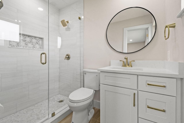 1522 Lance Rd, Jupiter, FL 33469 - full bathroom featuring vanity, a stall shower, and wood finished floors