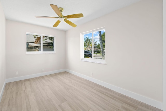 1522 Lance Rd, Jupiter, FL 33469 - unfurnished room featuring light wood-type flooring and a ceiling fan