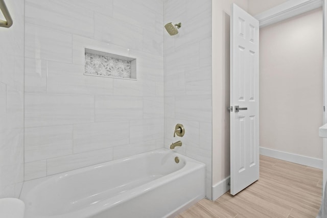 1522 Lance Rd, Jupiter, FL 33469 - full bath with shower / bath combination and wood finished floors
