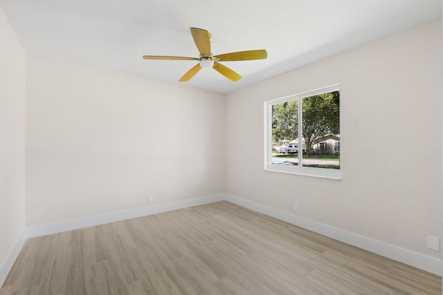 1522 Lance Rd, Jupiter, FL 33469 - spare room with wood finished floors and a ceiling fan