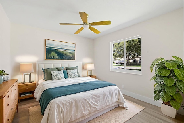 1522 Lance Rd, Jupiter, FL 33469 - bedroom with light wood-style flooring and a ceiling fan
