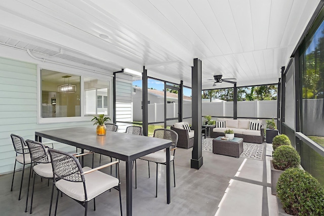 1522 Lance Rd, Jupiter, FL 33469 - sunroom with an outdoor hangout area, a ceiling fan, and outdoor dining space