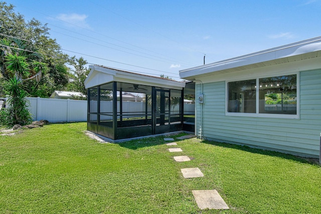 1522 Lance Rd, Jupiter, FL 33469 - fenced backyard featuring a sunroom