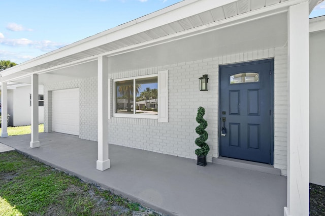 1522 Lance Rd, Jupiter, FL 33469 - property entrance with brick siding and covered porch