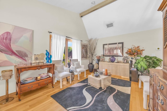 9070 NW 16th St, Plantation, FL 33322 - living area with beamed ceiling, wood finished floors, and high vaulted ceiling