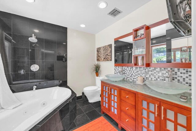 9070 NW 16th St, Plantation, FL 33322 - full bath with double vanity, recessed lighting, and decorative backsplash