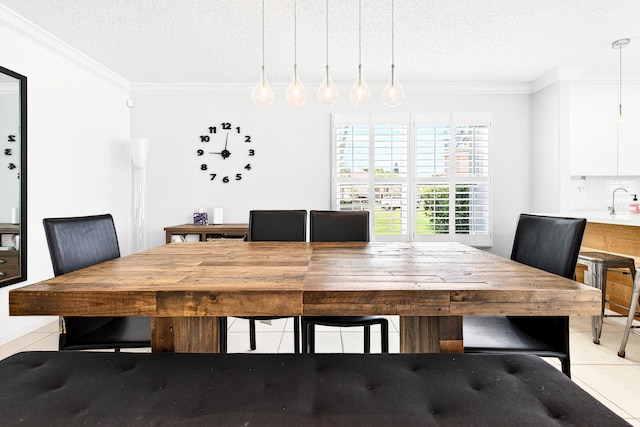 5086 Prairie Dunes Village Cir, Lake Worth, FL 33463 - dining space with light tile patterned floors, a textured ceiling, and ornamental molding
