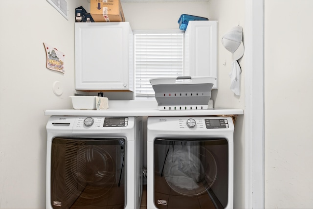5086 Prairie Dunes Village Cir, Lake Worth, FL 33463 - laundry area featuring washing machine and clothes dryer and cabinet space