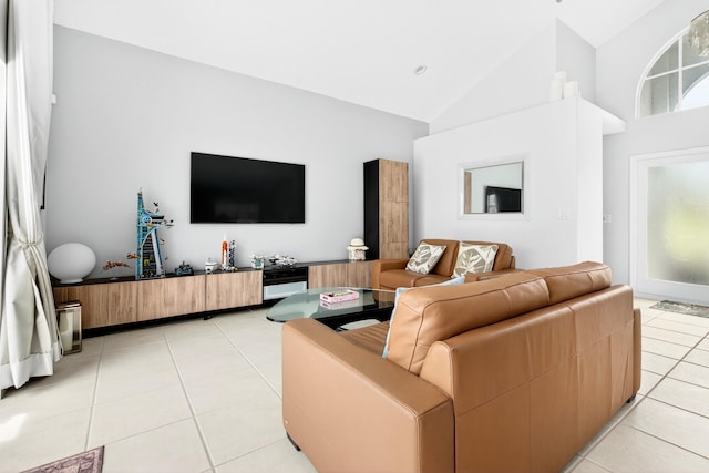 5086 Prairie Dunes Village Cir, Lake Worth, FL 33463 - living room featuring light tile patterned flooring and high vaulted ceiling