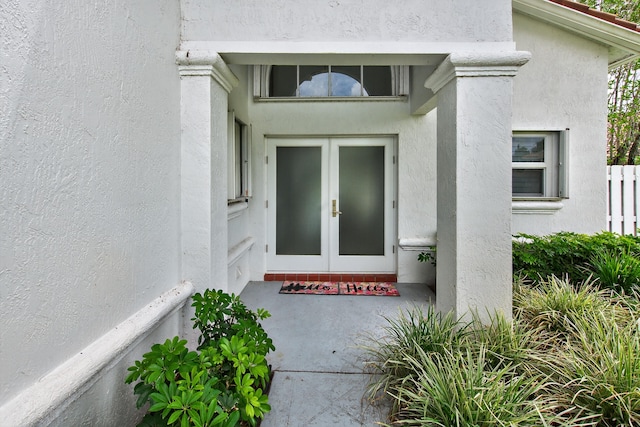 5086 Prairie Dunes Village Cir, Lake Worth, FL 33463 - property entrance with stucco siding and french doors