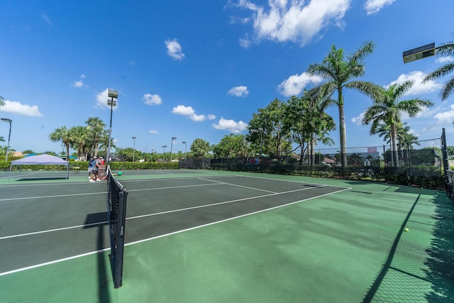 5086 Prairie Dunes Village Cir, Lake Worth, FL 33463 - view of tennis court with community basketball court