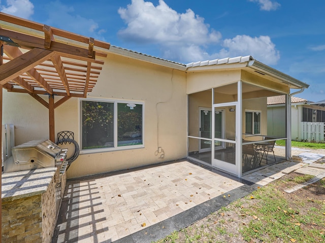 10889 Fillmore Dr, Boynton Beach, FL 33437 - rear view of property with stucco siding, a patio, and a sunroom