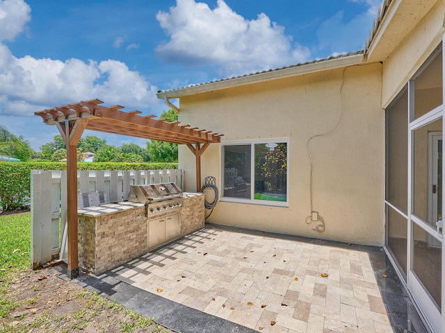 10889 Fillmore Dr, Boynton Beach, FL 33437 - view of patio with an outdoor kitchen and a pergola