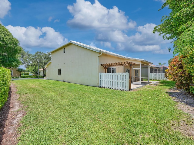 10889 Fillmore Dr, Boynton Beach, FL 33437 - rear view of house featuring a sunroom and stucco siding