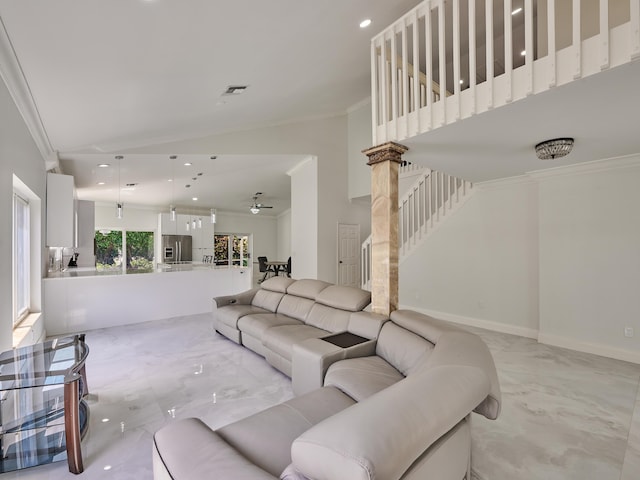 10889 Fillmore Dr, Boynton Beach, FL 33437 - living area featuring light marble finish floors, ornamental molding, recessed lighting, and stairs
