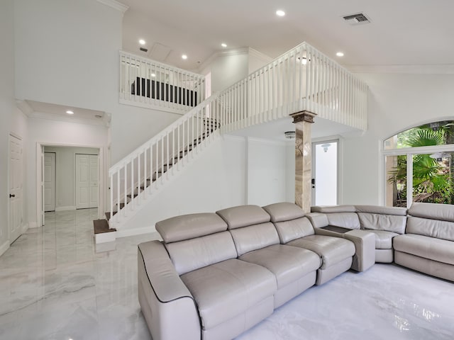 10889 Fillmore Dr, Boynton Beach, FL 33437 - living area featuring light marble finish flooring, a towering ceiling, ornamental molding, recessed lighting, and stairs