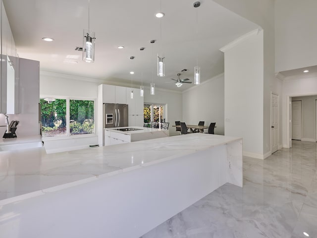 10889 Fillmore Dr, Boynton Beach, FL 33437 - kitchen featuring ornamental molding, stainless steel fridge with ice dispenser, modern cabinets, white cabinets, and light marble finish flooring