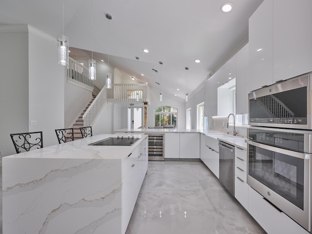 10889 Fillmore Dr, Boynton Beach, FL 33437 - kitchen featuring modern cabinets, beverage cooler, stainless steel appliances, light marble finish floors, and white cabinetry